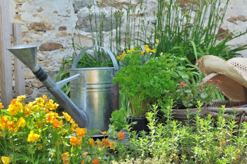 Photograph of a gardener preparing pathways in a Gipsy Hill residential garden emphasizing safe access